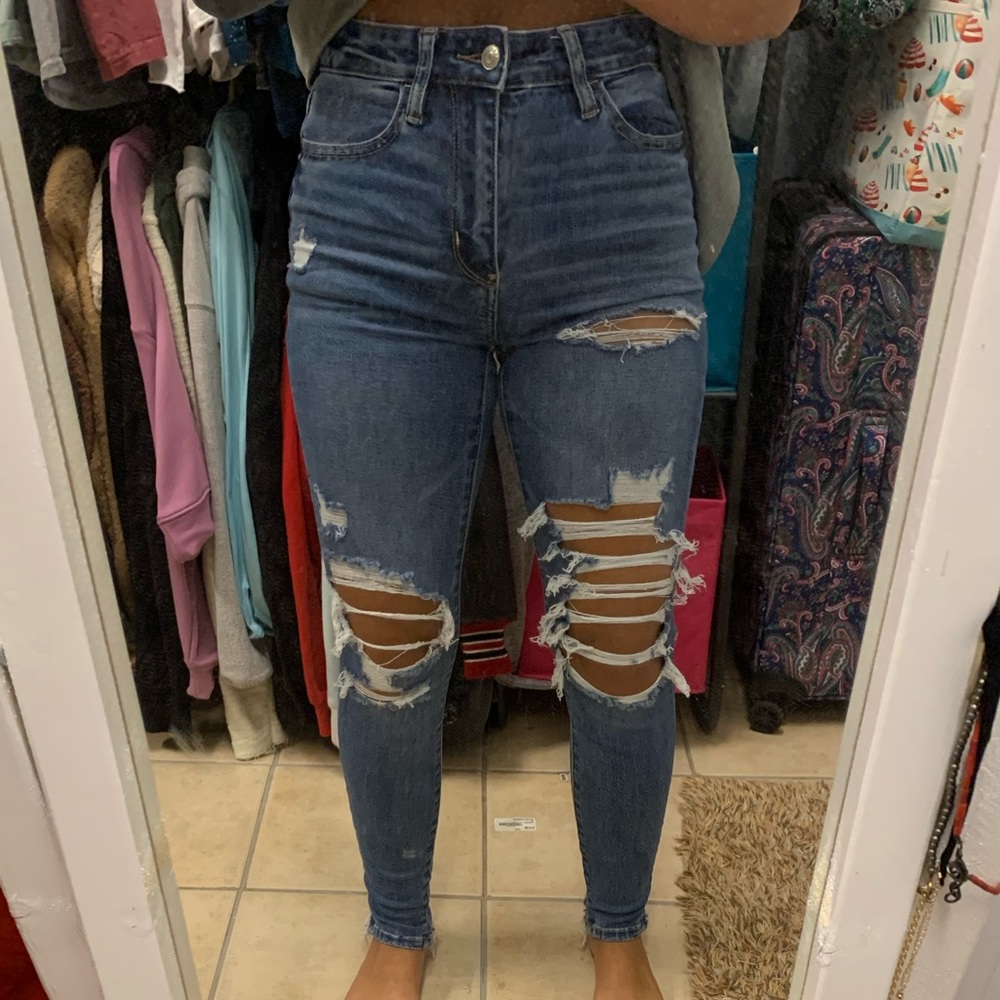 very cut up jeans